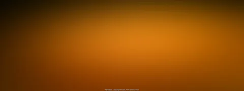 Weicher Farbverlauf in Orange und Braun, zur Mitte hin heller, an den Rändern dunkel werdend, ohne erkennbare Motive.