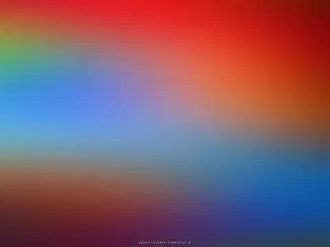 Weich verlaufender Farbverlauf: oben rot und orange, links grün, in der Mitte blau und violett, unten dunkelrot und blau.