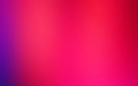 Weicher Farbverlauf von Violett links über Pink bis Rot oben rechts, ohne erkennbares Motiv.