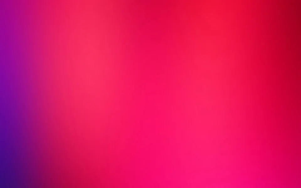 Weicher Farbverlauf von Violett links über Pink bis Rot oben rechts, ohne erkennbares Motiv.
