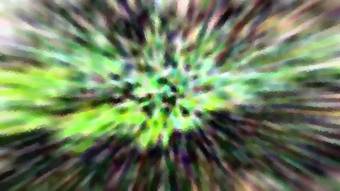 Abstrakte radiale Unschärfe mit grünen, violetten und weißen Streifen, die von einem hellen Zentrum nach außen laufen.