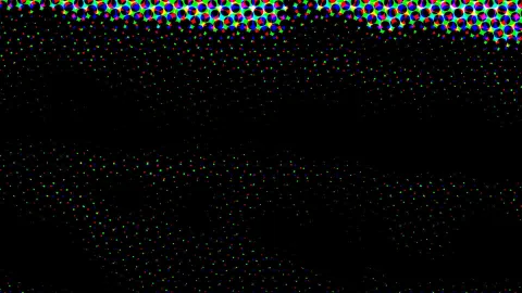 Schwarzer Hintergrund mit vielen kleinen grünen, roten und blauen Punkten, im oberen Bereich dichte bunte Kreismuster in Rot, Grün und Blau.