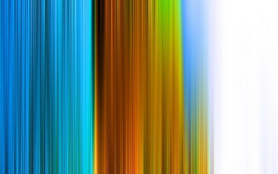 Vertikale Streifen in Blau, Braun, Orange, Gelb, Grün und Weiß, die von links nach rechts ineinander übergehen und nach rechts ins Weiß auslaufen.