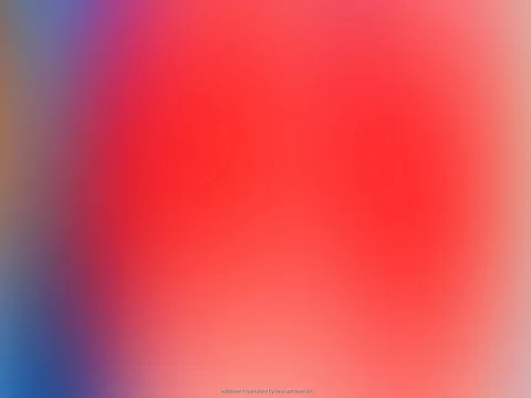 Unscharfer Farbverlauf mit leuchtendem Rot in der Mitte, Übergänge zu Pink, Blau und hellem Orange am Rand.