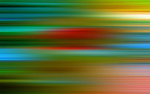 Abstraktes Bild aus horizontalen, verwischten Farbstreifen in Grün, Rot, Blau und Gelb, die von links nach rechts ineinanderlaufen.