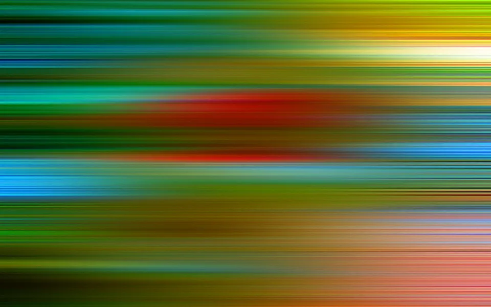Abstraktes Bild aus horizontalen, verwischten Farbstreifen in Grün, Rot, Blau und Gelb, die von links nach rechts ineinanderlaufen.