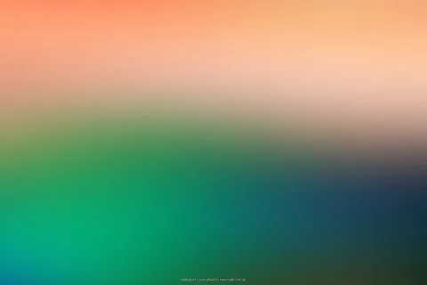 Unscharfer Farbverlauf: oben orange und pfirsichfarben, unten grün übergehend in Blau und Dunkelgrün.