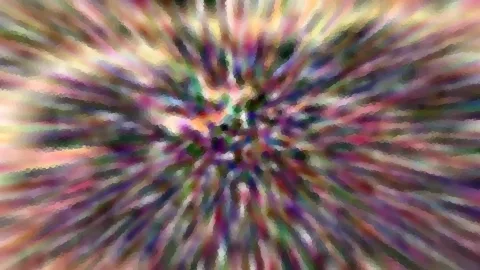 Abstraktes Bild mit bunten, pixeligen Streifen in Lila, Grün, Pink und Gelb, die von einem dunkleren Zentrum in der Mitte nach außen strahlen.
