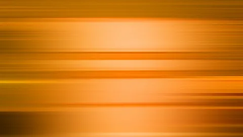 Abstrakte Bewegungsunschärfe aus horizontalen orangefarbenen und goldenen Lichtstreifen, die in der Mitte heller leuchten.