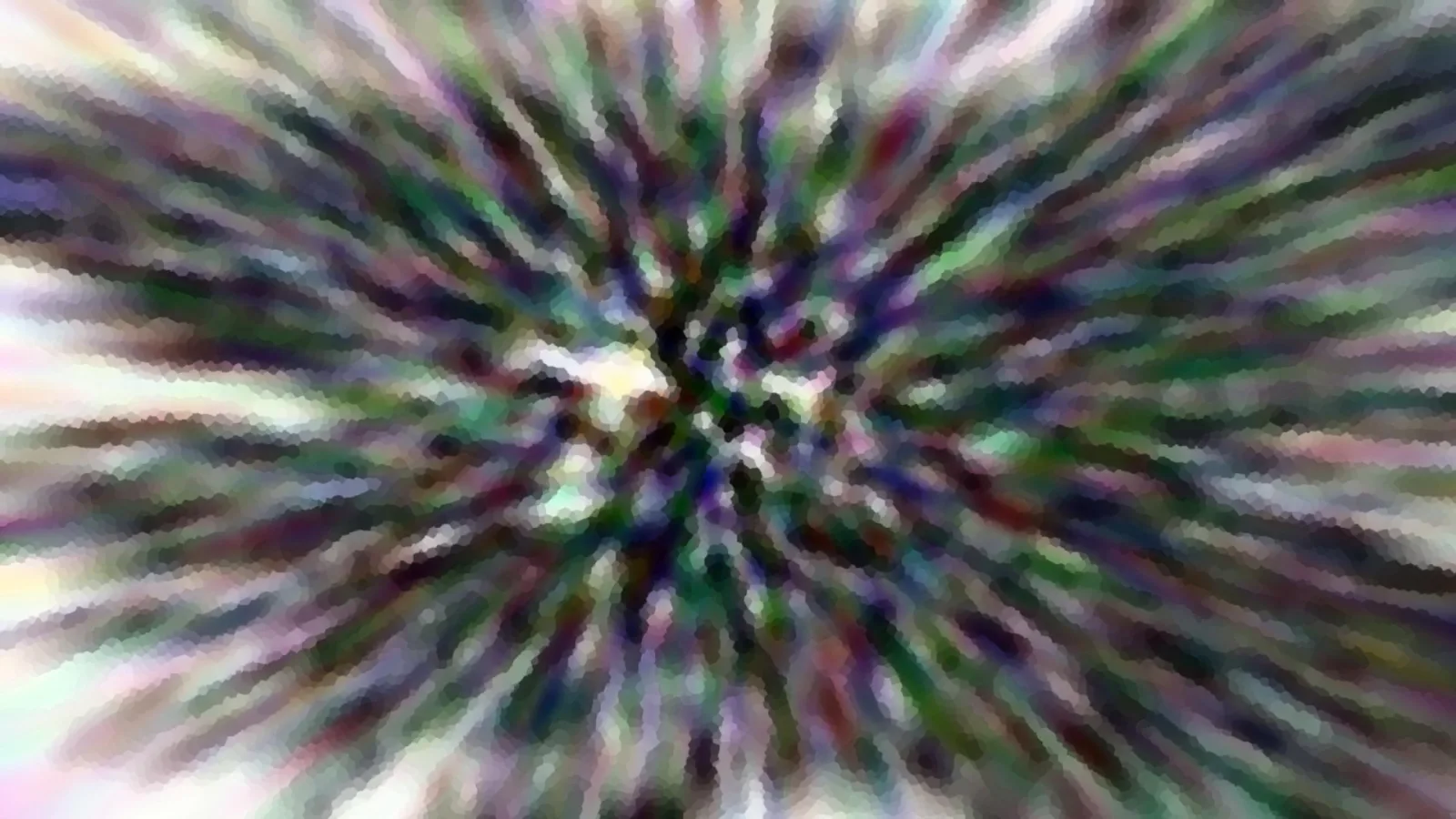 Abstrakte, bunte Streifen laufen radial von einem hellen Zentrum nach außen, unscharf und grobkörnig.