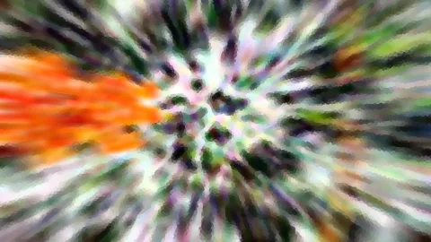 Abstrakte Komposition aus radialen Schlieren in Orange, Grün, Weiß und Schwarz, die von einem Zentrum nahe der Bildmitte nach außen laufen.
