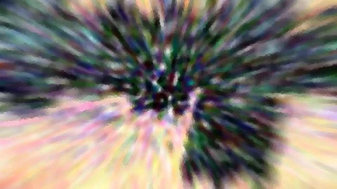Abstrakte Unschärfe mit radialen Streifen in Grün, Violett und Pastellgelb, die von einem dunklen Zentrum nach außen laufen.