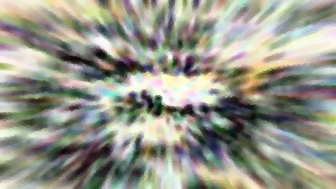 Abstrakte, radial verwischte Farbfläche in Grün, Violett und Weiß mit mosaikartiger Textur und hellem Zentrum.