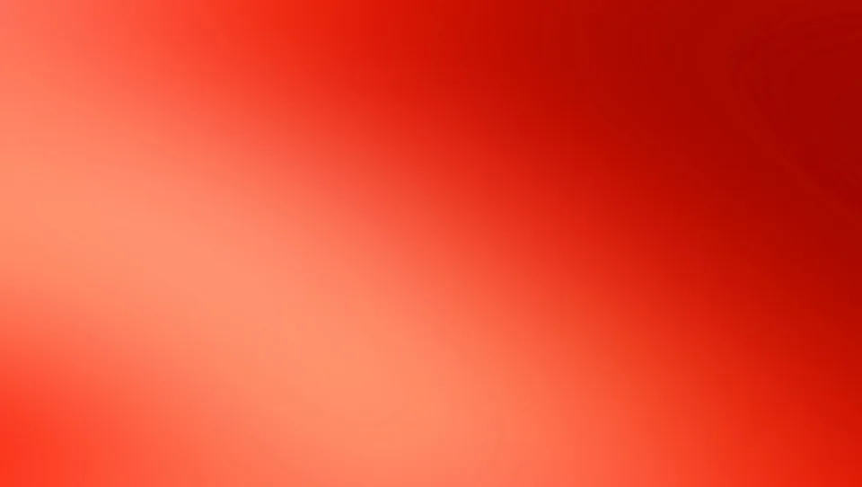 Unscharfer diagonaler Farbverlauf von hellem Korallenrot unten links zu dunklem Blutrot oben rechts.
