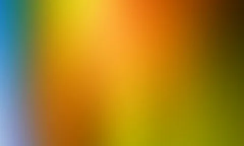 Weich verwischter Farbverlauf von Blau links über Gelb und Orange bis Dunkelgrün rechts.