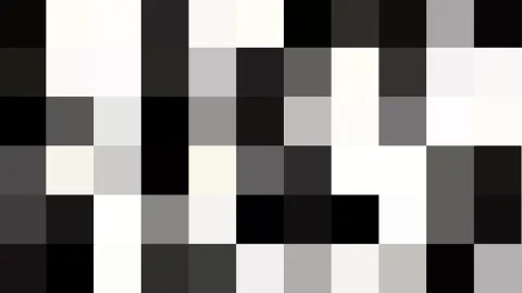 Abstraktes Raster aus quadratischen Blöcken in Schwarz, Weiß und verschiedenen Grautönen, ohne erkennbares Motiv.