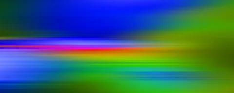 Horizontal verwischte Lichtstreifen in Blau, Grün, Magenta und Orange
