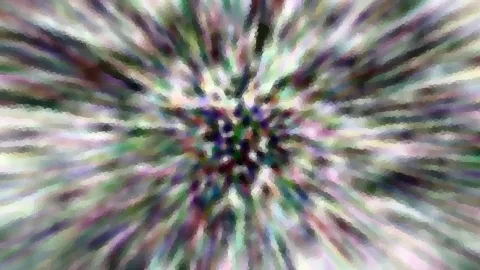 Abstrakte Komposition aus radial von einem dunklen Zentrum ausgehenden, bunten Streifen in Grün, Violett, Weiß und Rosa, bewegungsunscharf.