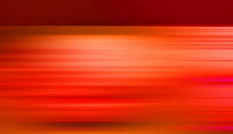 Abstrakte Bewegungsunschärfe aus horizontalen roten und orangefarbenen Streifen, oben dunkler, in der Mitte helles Orange.
