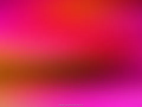 Unscharfer Farbverlauf mit Rot, Pink und einem dunkleren Braunrot in der Bildmitte, ohne erkennbare Motive.
