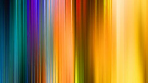Vertikale, verwischte Lichtstreifen in Blau, Violett, Orange, Rot und Gelb, die von links nach rechts ineinander übergehen.