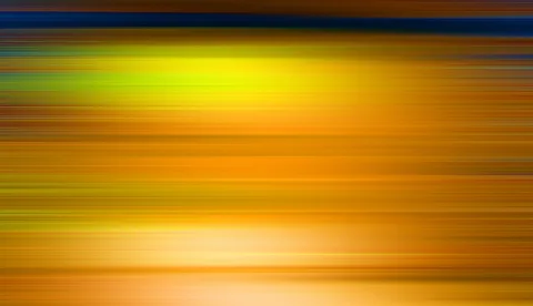 Horizontale Streifen in Orange, Gelb und Blau mit hellem Leuchten im unteren Bildbereich.