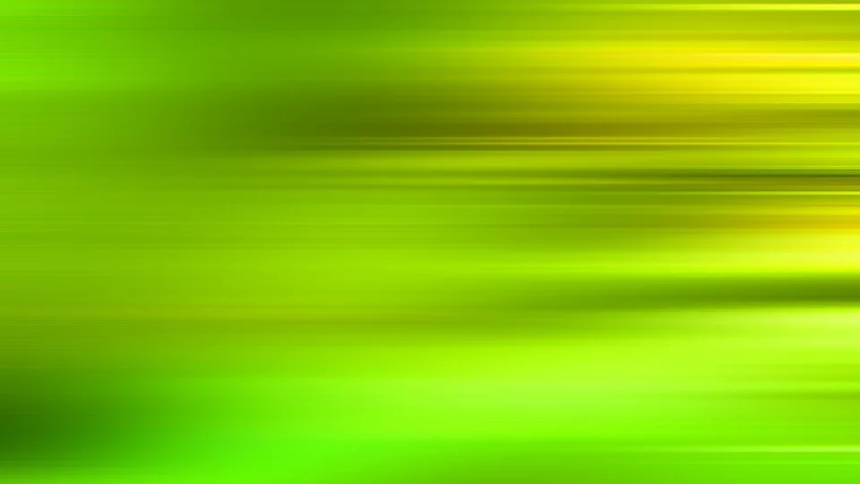 Horizontal verwischte Streifen in Grün- und Gelbtönen, die von links nach rechts fließen.