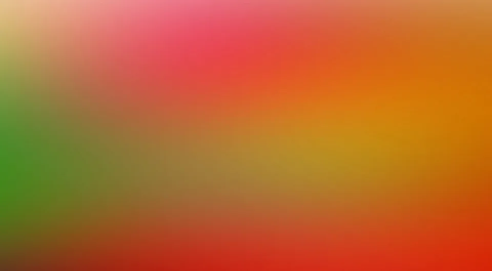 Unscharfer Farbverlauf mit grünen Flächen links, Rot und Pink oben und Orange sowie Rot unten rechts.