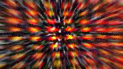 Abstrakte Komposition aus radial von der Mitte nach außen laufenden, verwischten Streifen in Rot, Orange, Gelb und Dunkelgrün mit leuchtendem Zentrum.