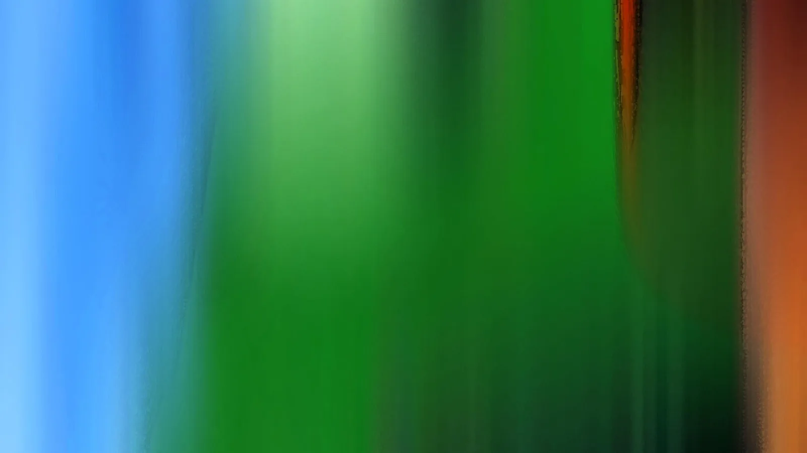 Abstrakte vertikale Farbverläufe in Blau, Grün und Orange, durch Bewegungsunschärfe verwischt.