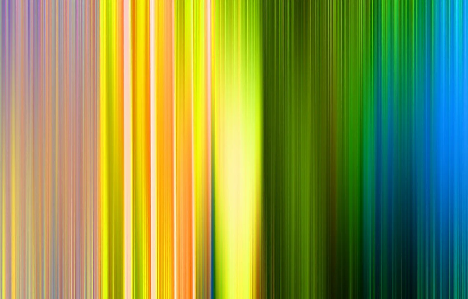 Abstrakte vertikale Streifen in Gelb, Orange, Grün und Blau, die von links nach rechts ineinander übergehen und unscharf wirken.