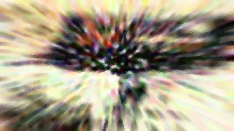 Abstrakte Komposition aus radial verlaufenden, farbigen Schlieren mit dunklem Zentrum und pixeligem Muster