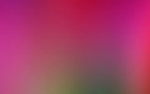 Unscharfer Farbverlauf von Magenta oben links über Rot in der Mitte bis zu Olivgrün und Dunkelgrün unten.