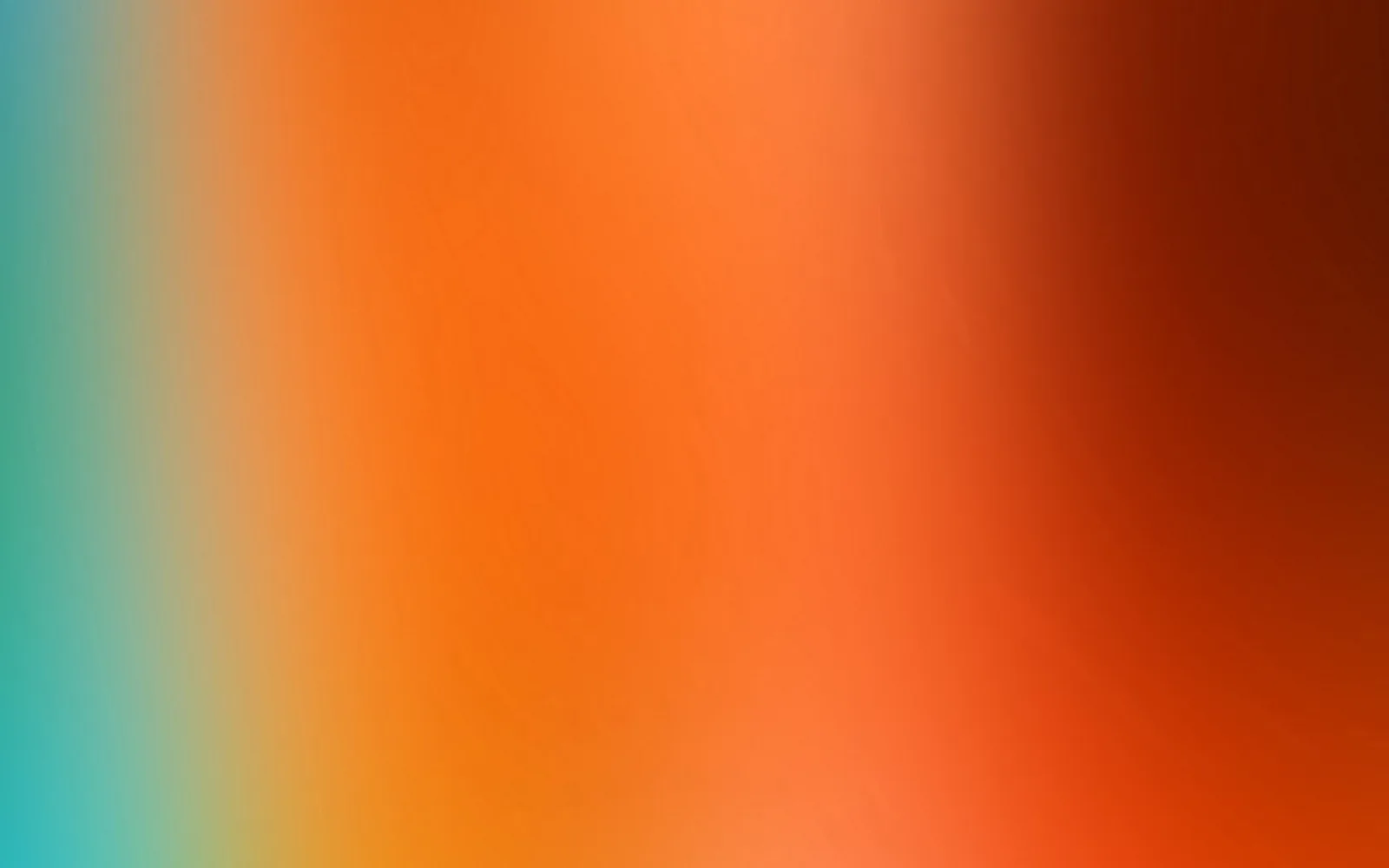 Unscharfer Farbverlauf von Türkis am linken Rand über Orange bis zu dunklem Braunrot am rechten Rand.