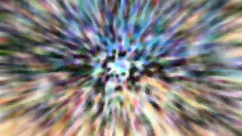 Abstraktes Bild mit radialen, bunten Streifen in Blau, Grün, Violett und Gelb, die von einem hellen Zentrum nach außen strahlen. Das Bild wirkt wie aus kleinen Farbflächen mosaikartig zusammengesetzt.