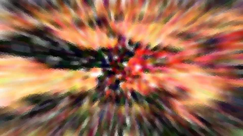 Abstrakte Komposition aus strahlenförmigen, verwischten Farbstreifen in Orange, Rot, Gelb und Grün, die von einem dunklen Zentrum in der Mitte nach außen verlaufen und pixelig wirken.
