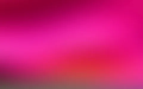 Unscharfer Farbverlauf von dunklem Magenta oben über leuchtendes Pink bis zu Rot und grauem Schimmer am unteren Rand.