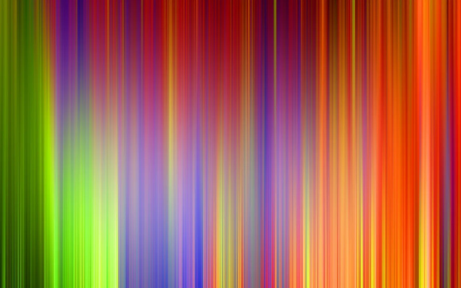 Abstrakte Komposition aus vertikalen, unscharfen Streifen in Grün, Gelb, Violett, Blau, Rot und Orange, die von links nach rechts ineinander übergehen.