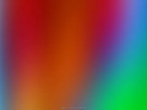 Diagonaler, stark verwischter Farbverlauf von Dunkelrot über Orange und Magenta bis zu Blau und Grün