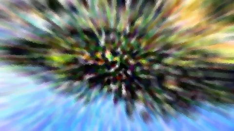 Abstraktes Bild mit radialen Farbstrahlen, die von einem bunten Zentrum nach außen laufen, grün, gelb, violett und blau.