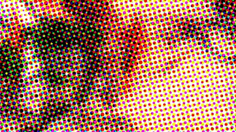 Raster aus farbigen Punkten in Rot, Gelb, Magenta und Cyan, die zur Bildmitte hin in eine große schwarze Fläche übergehen