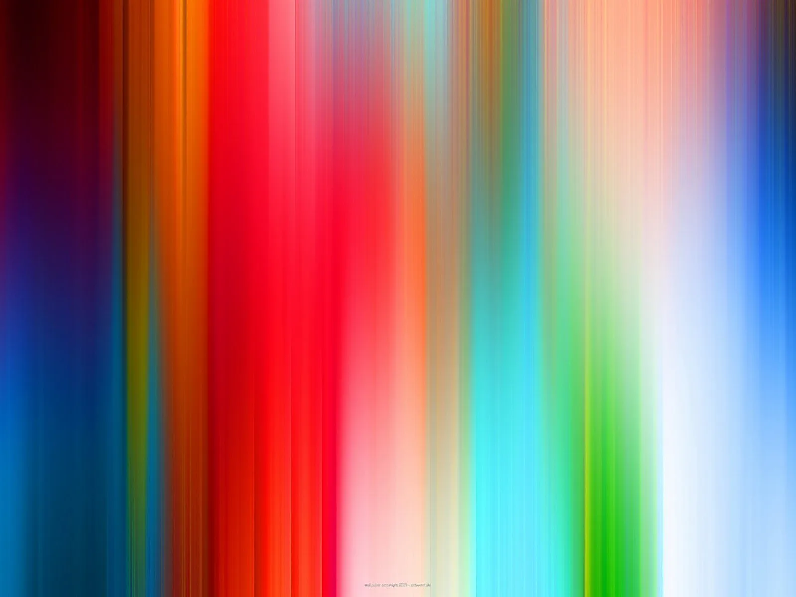 Vertikale, unscharfe Farbstreifen in Rot, Orange, Blau, Grün und Weiß, die von oben nach unten verlaufen und wie Bewegungsspuren wirken.