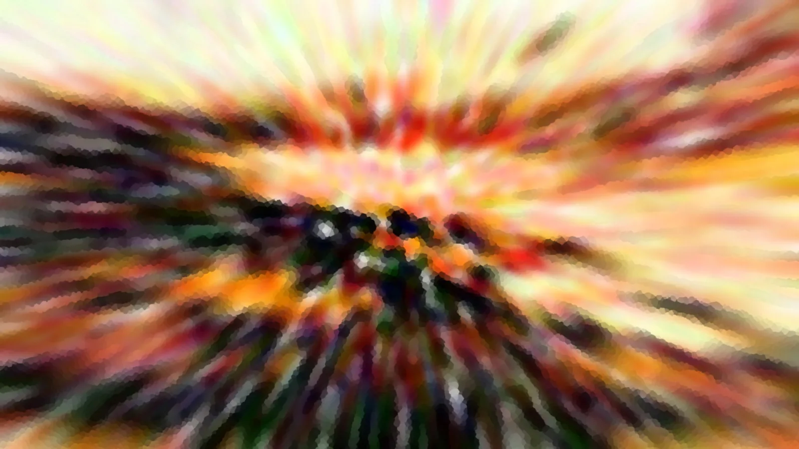 Abstrakte, radial verwischte Farbfläche in Rot, Orange und Gelb mit dunklem Zentrum und mosaikartiger Struktur.