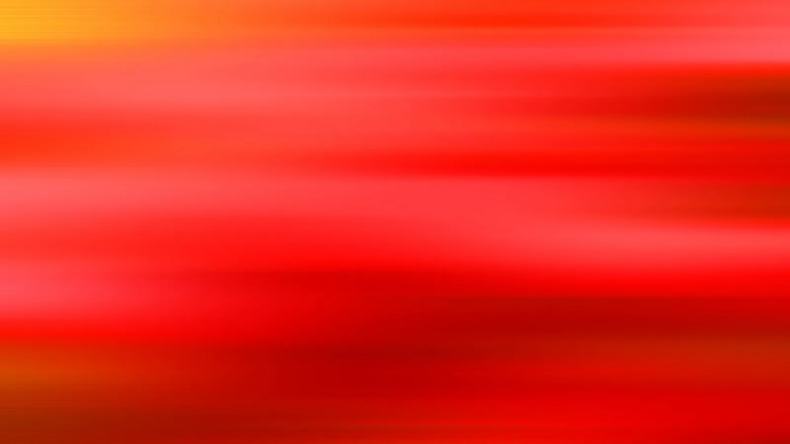 Horizontale Streifen in Rot und Orange mit weichen Übergängen, am oberen linken Rand gelblich leuchtend, nach unten dunkler werdend.