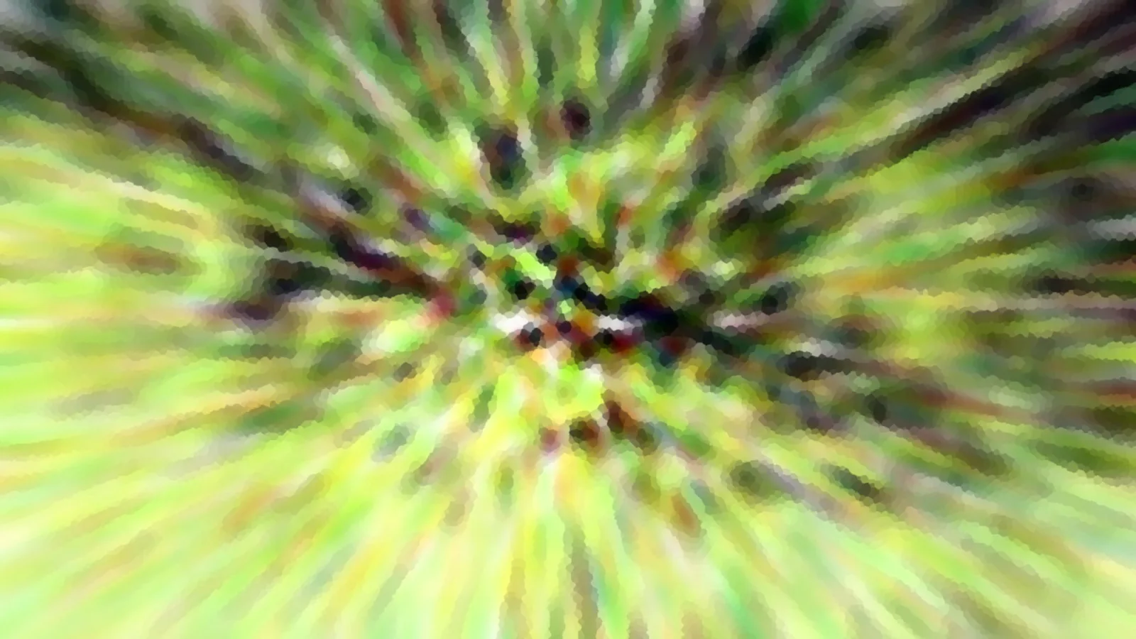 Abstrakte Aufnahme mit radialem Zoomeffekt: grüne, gelbe und dunkle Farbstreifen laufen von einem zentralen Punkt nach außen, mosaikartig verpixelt.