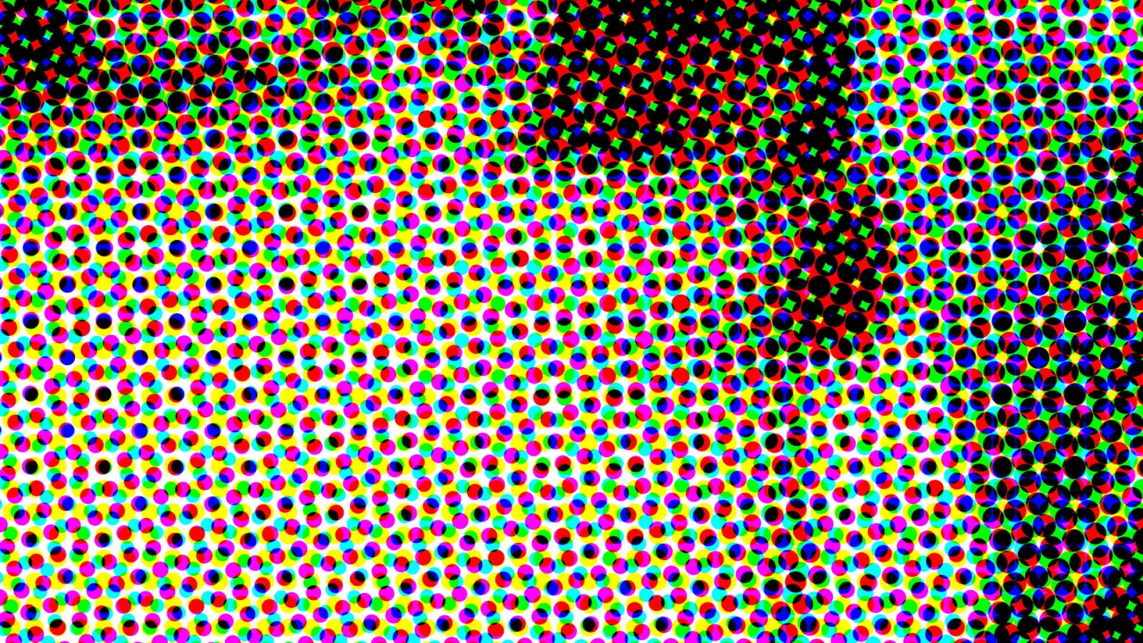 Dichtes Raster aus bunten Punkten in Rot, Grün, Blau, Gelb und Magenta, rechts oben werden die Flächen dunkel und schwarz.