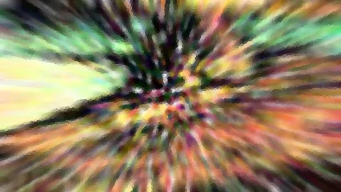Abstraktes Bild aus bunten Farbstrahlen, die von einem dunklen Zentrum nach außen laufen, grob gepixelt. Links leuchtet ein heller gelblich-grüner Bereich.
