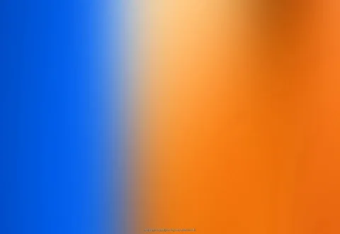 Unscharfer Farbverlauf: links kräftiges Blau, rechts warmes Orange mit hellem Lichtfleck oben in der Mitte.
