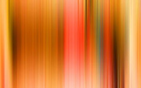 Abstrakte, vertikal verwischte Streifen in Orange, Gelb, Rot und Braun, die von hell nach dunkel wechseln.