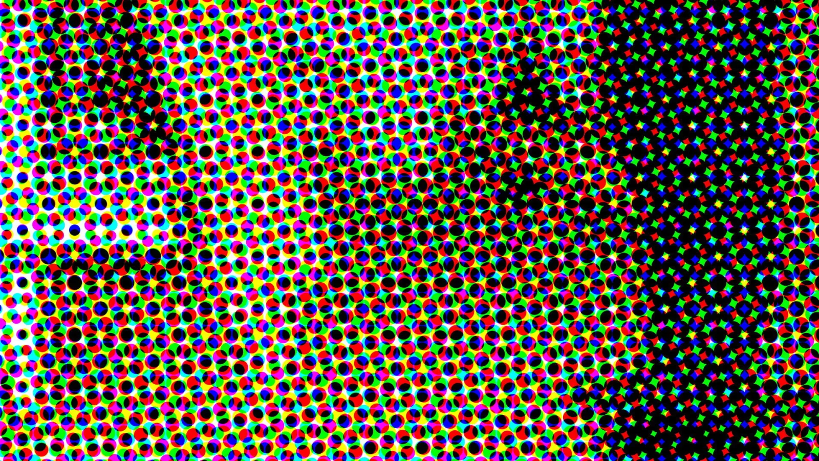 Dichtes Raster aus bunten RGB-Punkten, links hell, nach rechts in Schwarz übergehend.